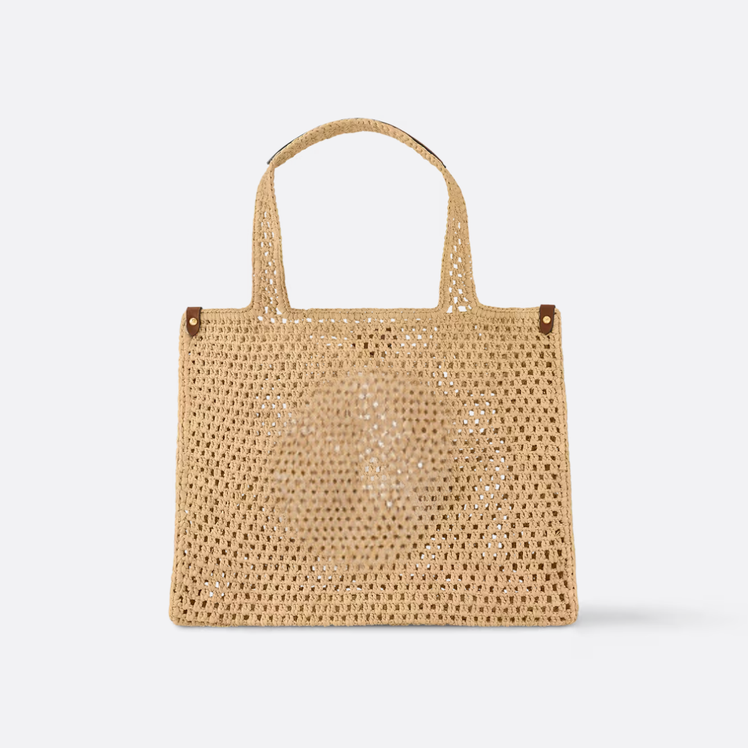 ONTHEGO MM HAND BAG MADE OF RAFFIA BY THE POOL